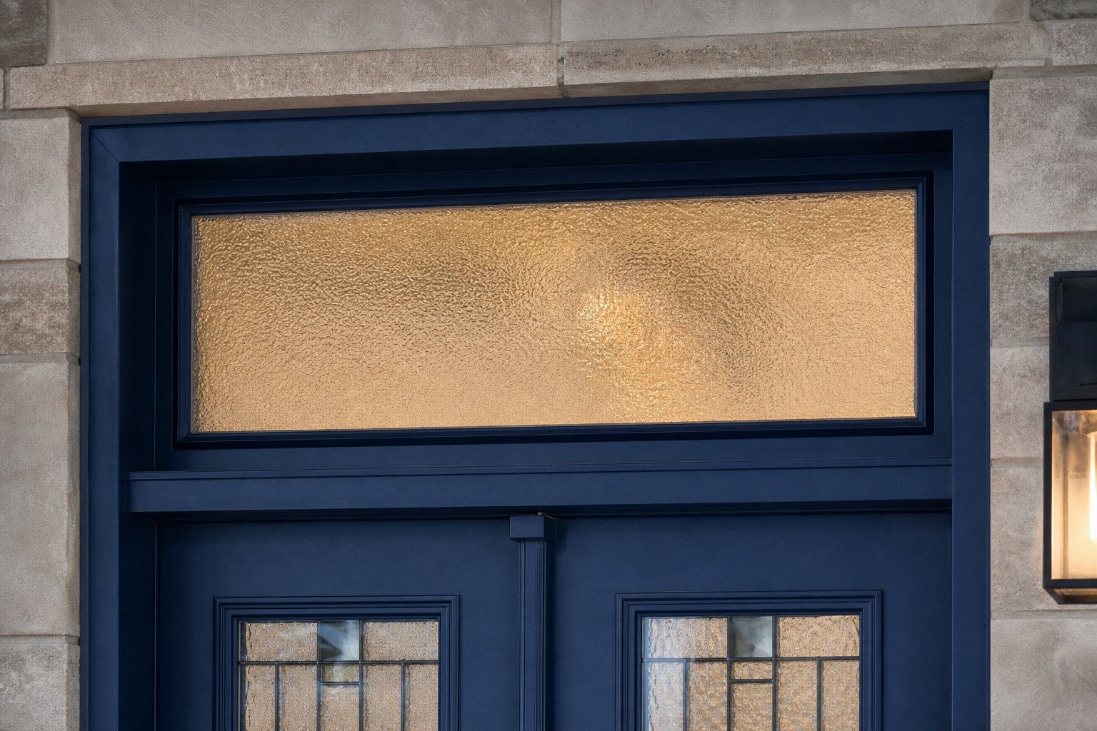 Diffused privacy glass in a rectangular door transom